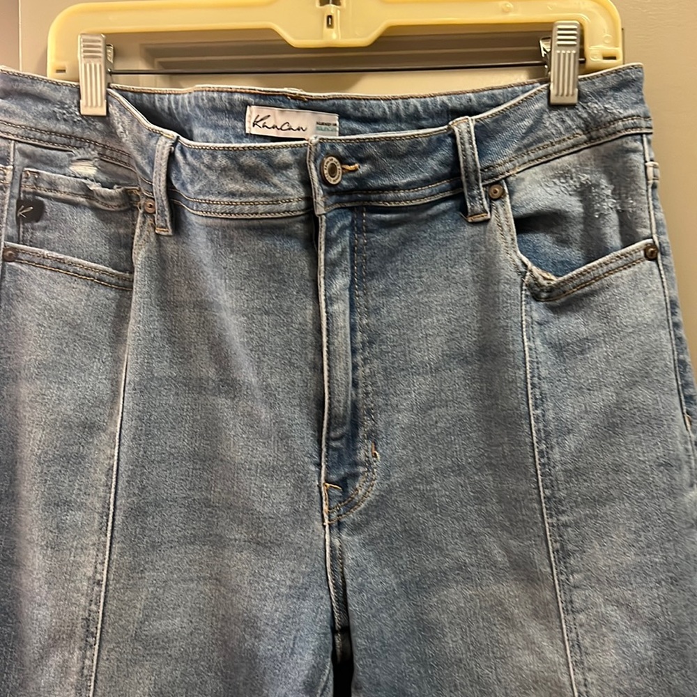 Distressed jeans by Kancan